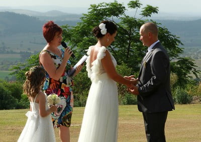 Renee Wilkins conducting a wedding ceremony