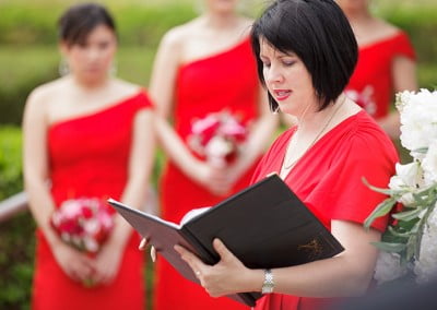 Renee Wilkins conducting a wedding ceremony