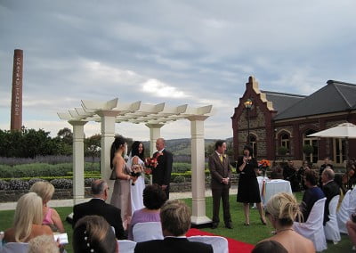 Renee Wilkins conducting a wedding ceremony