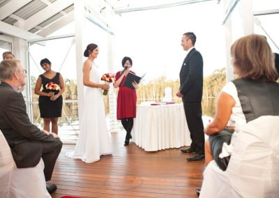 Renee Wilkins conducting a wedding ceremony 